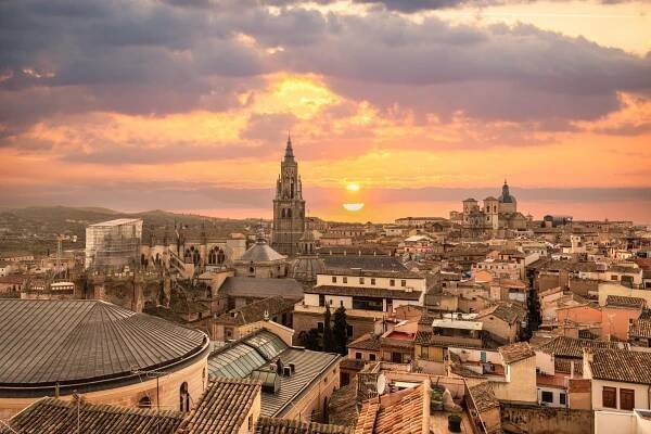 Sunset From The Rooftops In The Medieval City Of Toledo In Castilla La Mancha, Spain