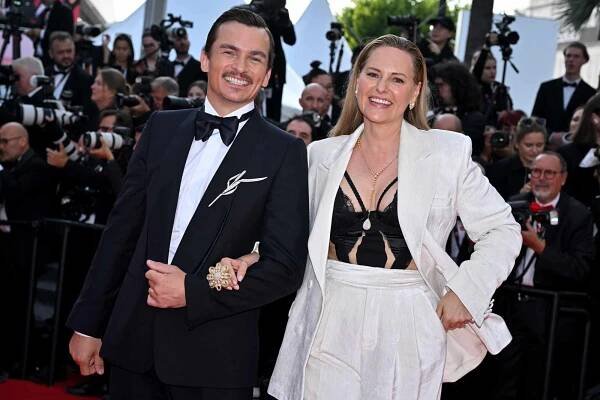 Rupert Friend and Aimee Mullins attend the "The Phoenician Scheme" red carpet at the 78th annual Cannes Film Festival at Palais des Festivals on May 17, 2025 in Cannes, France.