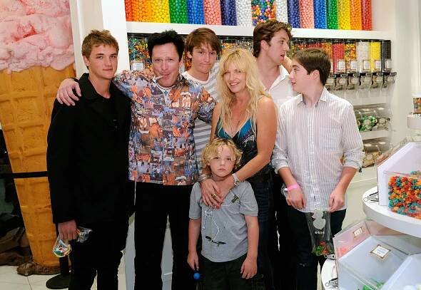 Michael and DeAnna Madsen, with his children Hudson, Max, Luke, Christian, and Kalvin, attend the Sugar Factory at Paris Las Vegas on July 16, 2011 | Source: Getty Images