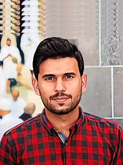Man in red plaid shirt portrait.