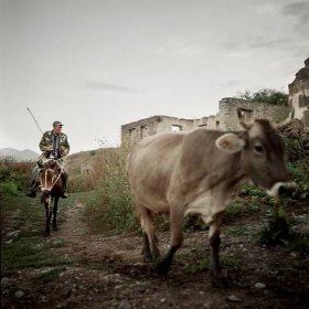  Hak, Kashatagh (Lachin) province. The shepherd comes back from the pasture at night. All the villagers pay him to take care of the beasts. Many inhabitants have beasts even if they are not all farmers. Their idea is to insure a food self-suffiency. 