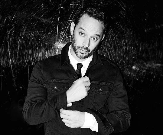 Image may contain Face Human Person Nick Kroll Clothing Apparel Jacket Coat and Beard