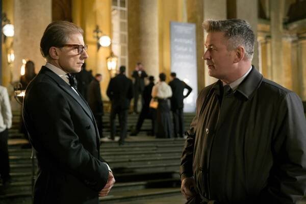 Simon McBurney and Alec Baldwin in 'Mission: Impossible - Rogue Nation' (2015).