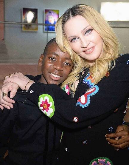 Madonna Steps Out with Son David Banda Before Woman of the Year Honors: 'My Family Is Everything — I Will Go to War for Them'