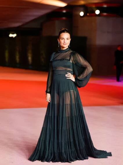 Alicia Vikander wears a sheer Louis Vuitton dress to the Academy Museum of Motion Pictures 3rd annual gala