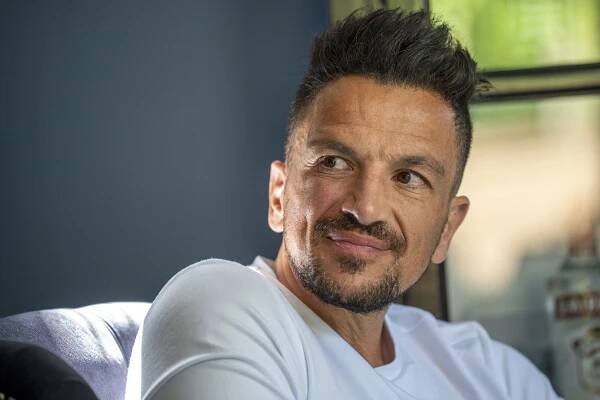 Peter Andre in a white shirt.
