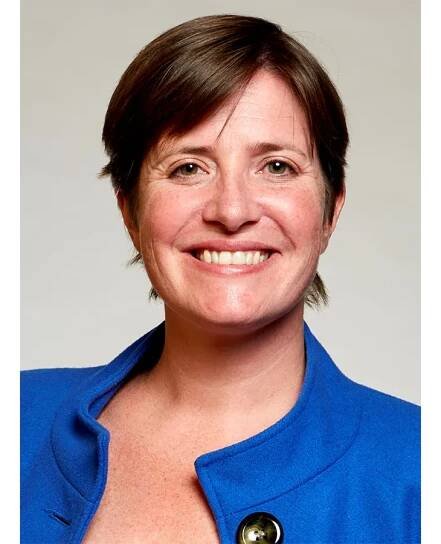 Professor Rachel O’Reilly in a blue jacket smiling for the camera
