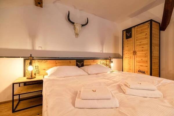 Posteľ alebo postele v izbe v ubytovaní Pivní Hotel