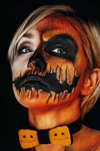 Half Face Pumpkin Halloween Makeup