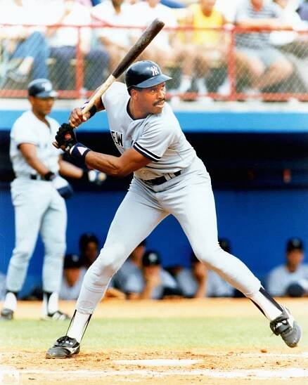 Full length color action batting portrait of Hall of Famer, David Mark 'Dave' Winfield, New York Yankees, road uniform c. 1981-88.