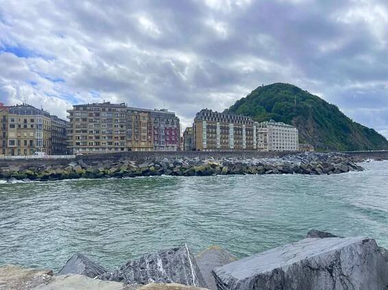 The river in San Sebastian with historic buildings in the background