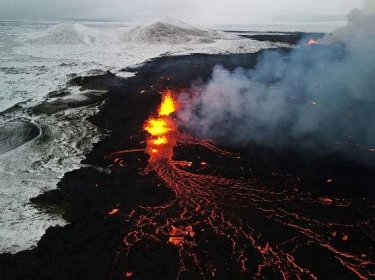 A drone picture shows lava spewing from the site of the volcanic eruption north of Grindavik - 19 December 2023