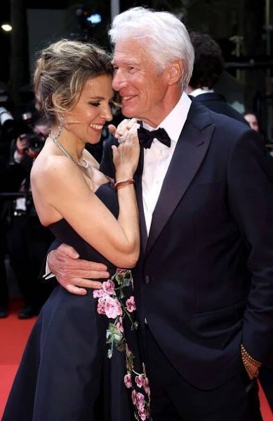 Alejandra Silva and Richard Gere depart the "Oh, Canada" Red Carpet 
