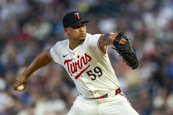 Minnesota Twins pitcher Jhoan Duran throwing a pitch.