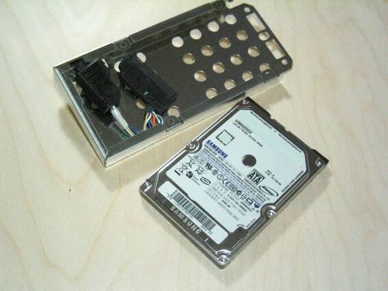 The hard drive outside of its metal casing