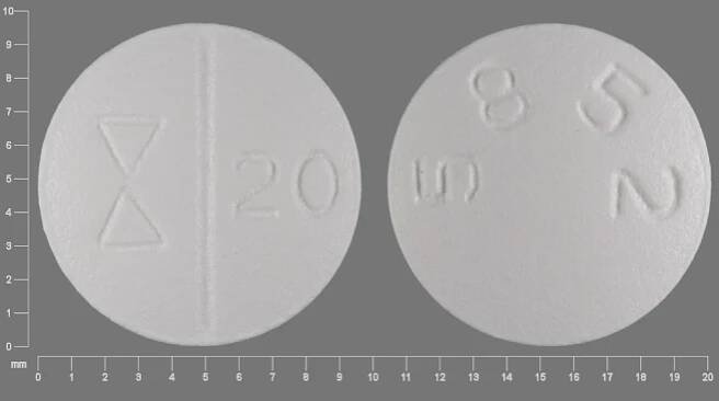 Pill OP 703 White Round is Urecholine