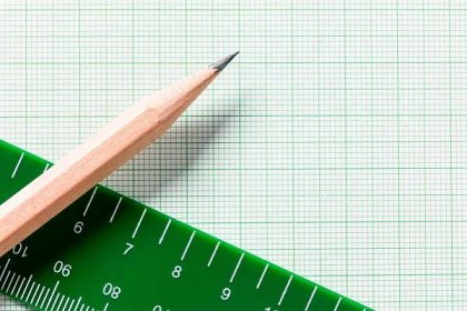 High Angle View Of Pencil With Graph Paper And Ruler
