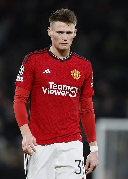 Scott McTominay of Manchester United looking dejected during a soccer match.