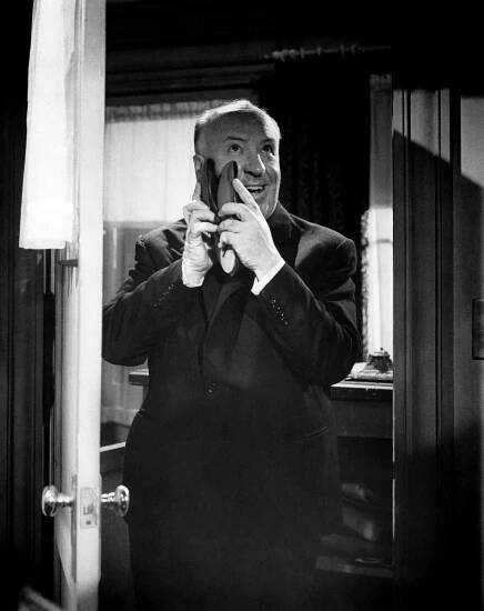 PSYCHO, Alfred Hitchcock, clowning around on-set, 1960