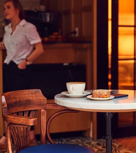 A Person Sitting At A Table