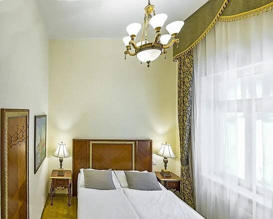 Postel nebo postele na pokoji v ubytování Residence Romanza