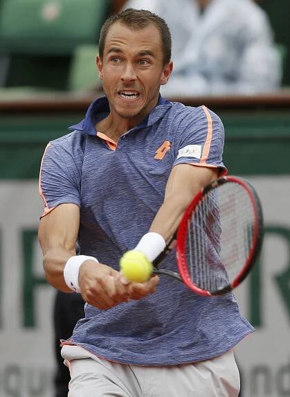 Lukáš Rosol v zápase prvního kola French Open proti Stanu Wawrinkovi