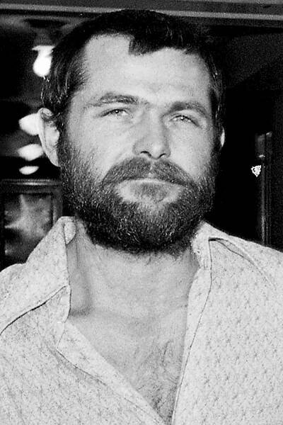 Bruce Davis leaves court after a hearing on December 22, 1970 in Los Angeles, California.