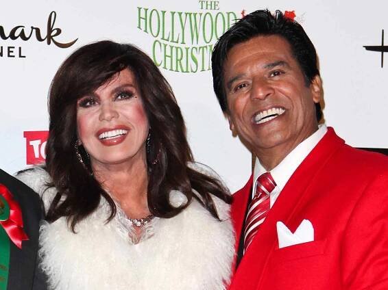 Marie Osmond and actor Erik Estrada arrive at the 80th Anniversary Hollywood Christmas Parade on November 27, 2011 in Hollywood, California