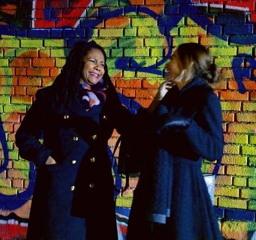 Gallery owner Liza (Tonya Pinkins) and Claire (Lena Olin) reminisce about their past in New York City in THE ARTIST’S WIFE. Photo by Michael Lavine