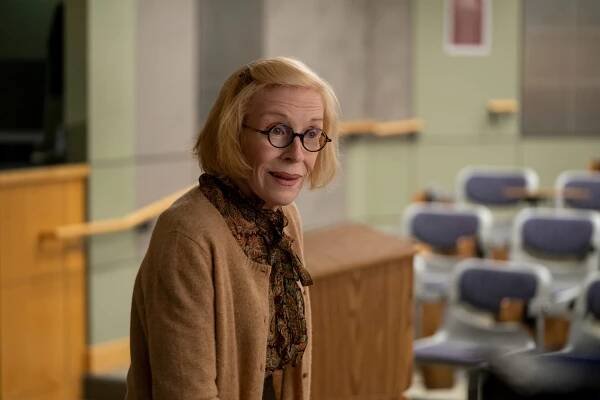 Image may contain Human Person Holland Taylor Clothing Apparel Wood Scarf Glasses Accessories and Accessory