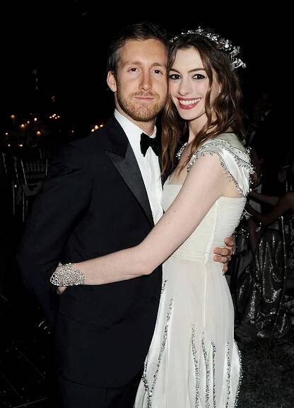 Adam Shulman and Anne Hathaway hugging