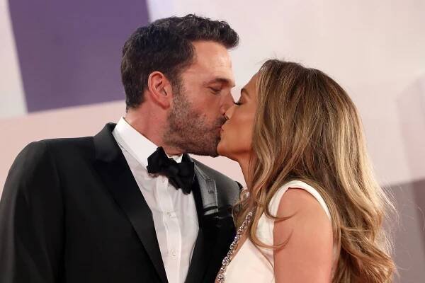 Ben Affleck and Jennifer Lopez kiss on the red carpet during the premiere of "The Last Duel" during the 78th Venice International Film Festival in Venice, Italy on September 10, 2021.
