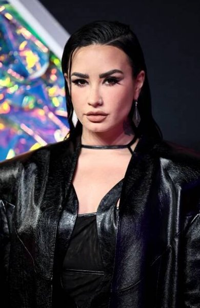 Demi Lovato wearing a black jacket at the 2023 MTV Video Music Awards in Newark, New Jersey