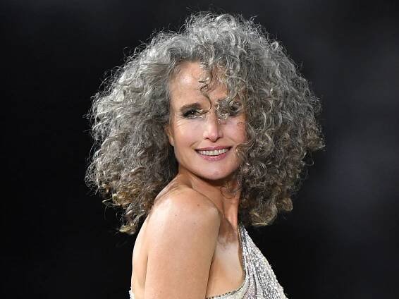 Andie MacDowell’s Natural Gray Curls Shine on the Runway in Paris