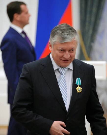 FILE PHOTO: Former Russian chess world champion Karpov walks away from Russia's President Medvedev during an awarding ceremony in Moscow's Kremlin