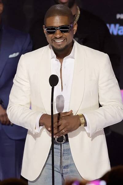Usher accepts the Lifetime Achievement Award onstage during the 2024 BET Awards at Peacock Theater on June 30, 2024