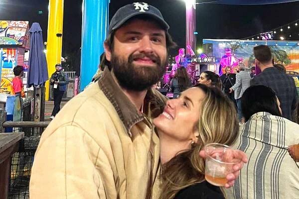Addison Timlin smiles with her boyfriend Cooper Raiff.
