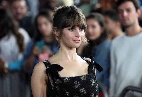 This image may contain Ruth Bader Ginsburg Face Human Person Glasses Accessories Accessory and Felicity Jones