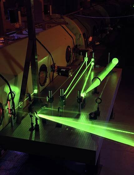 Bright green neon looking lasers for the N-237 Ballistic Range Optical Telemetry Circuit (onboard flying model instrumentation) with laser tracking.