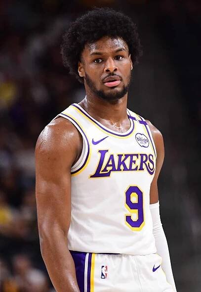Bronny James #9 of the Los Angeles Lakers looks on during the game against the Phoenix Suns on October 6, 2024 at Acrisure Arena in Palm Springs, California.