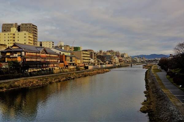 Sunrise over the Kamo River in Kyoto.