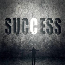 Concept of success, man stand on wall with text.