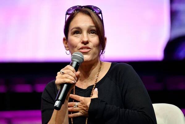 Amy Jo Johnson speaks during the 