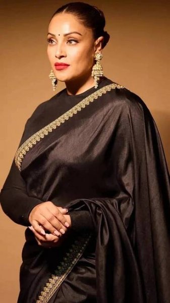 Bipasha Basu captivates in a timeless black satin saree