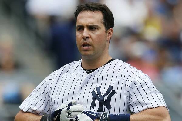 Mark Teixeira walks off the field after striking out against the Indians on Sunday.