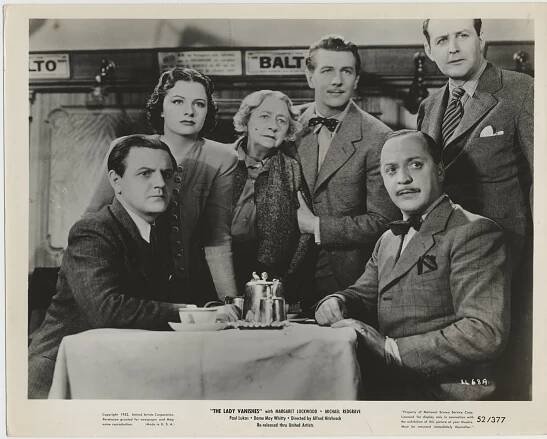 L-R: Naunton Wayne, Margaret Lockwood, Dame May Whitty, Michael Redgrave, Basil Radford and Cecil Parker in The Lady Vanishes (1938, dir. Alfred Hitchcock)