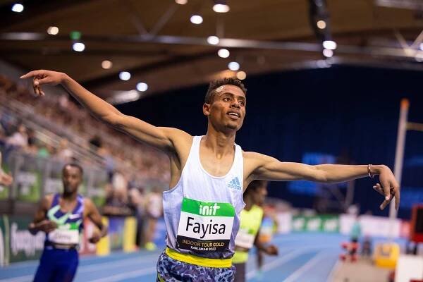 Abdisa Fayisa celebrates his 3000m win at the World Indoor Tour Gold meeting in Karlsruhe