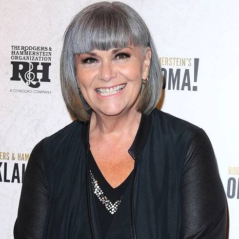 Dawn French smiles against a monochrome backdrop