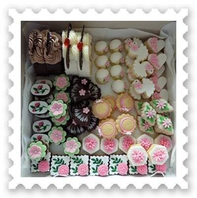 a box filled with lots of different types of cookies
