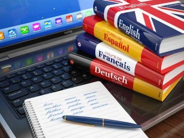 E-learning. Learning languages online. Dictionaries on laptop.